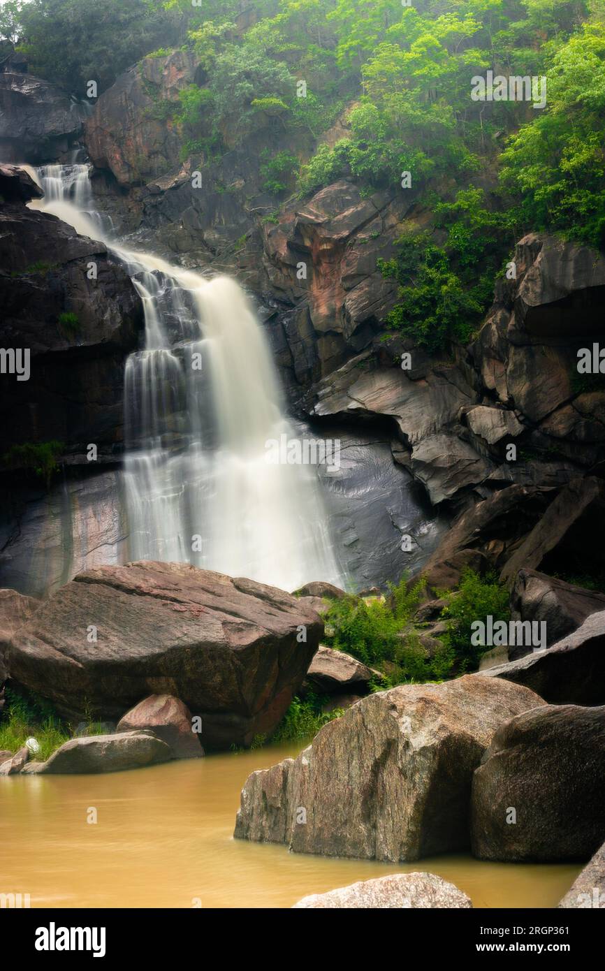 Silky milky smooth waterfall flowing over rocks at Hundru Ranchi ...