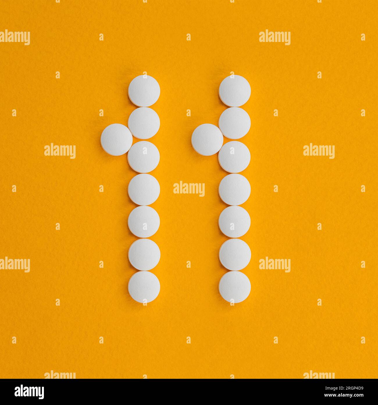 Math symbols made from medical capsules. Stock Photo