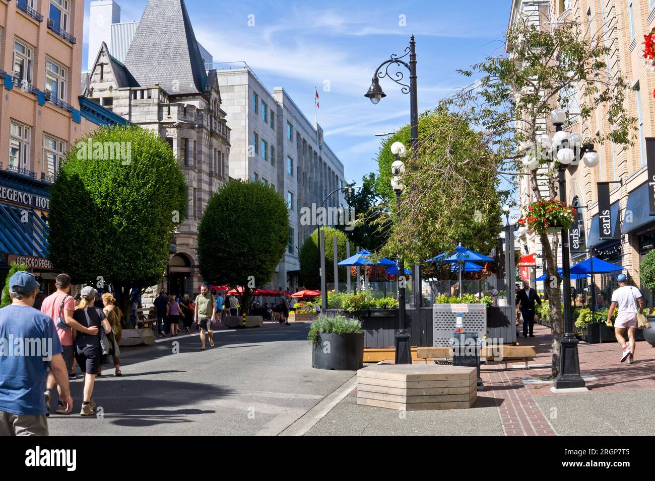 People walking along Government Street in downtown Victoria, BC, Canada