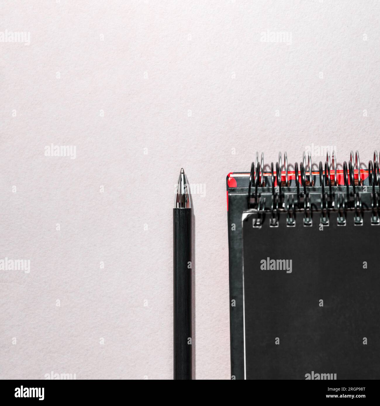 https://c8.alamy.com/comp/2RGP98T/closed-notepads-with-pen-copy-space-2RGP98T.jpg