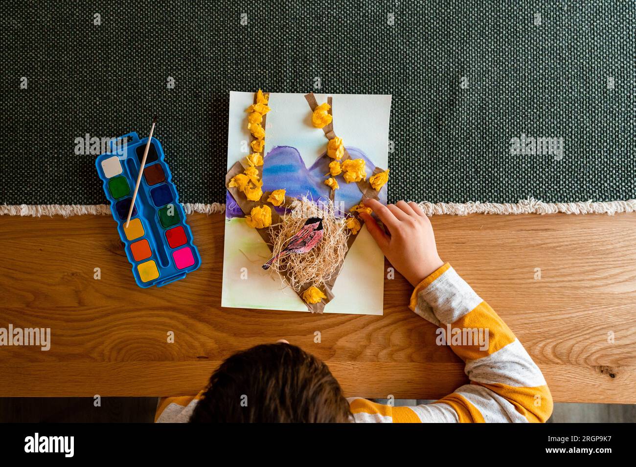 Boy sitting on the dining table hi-res stock photography and images - Alamy