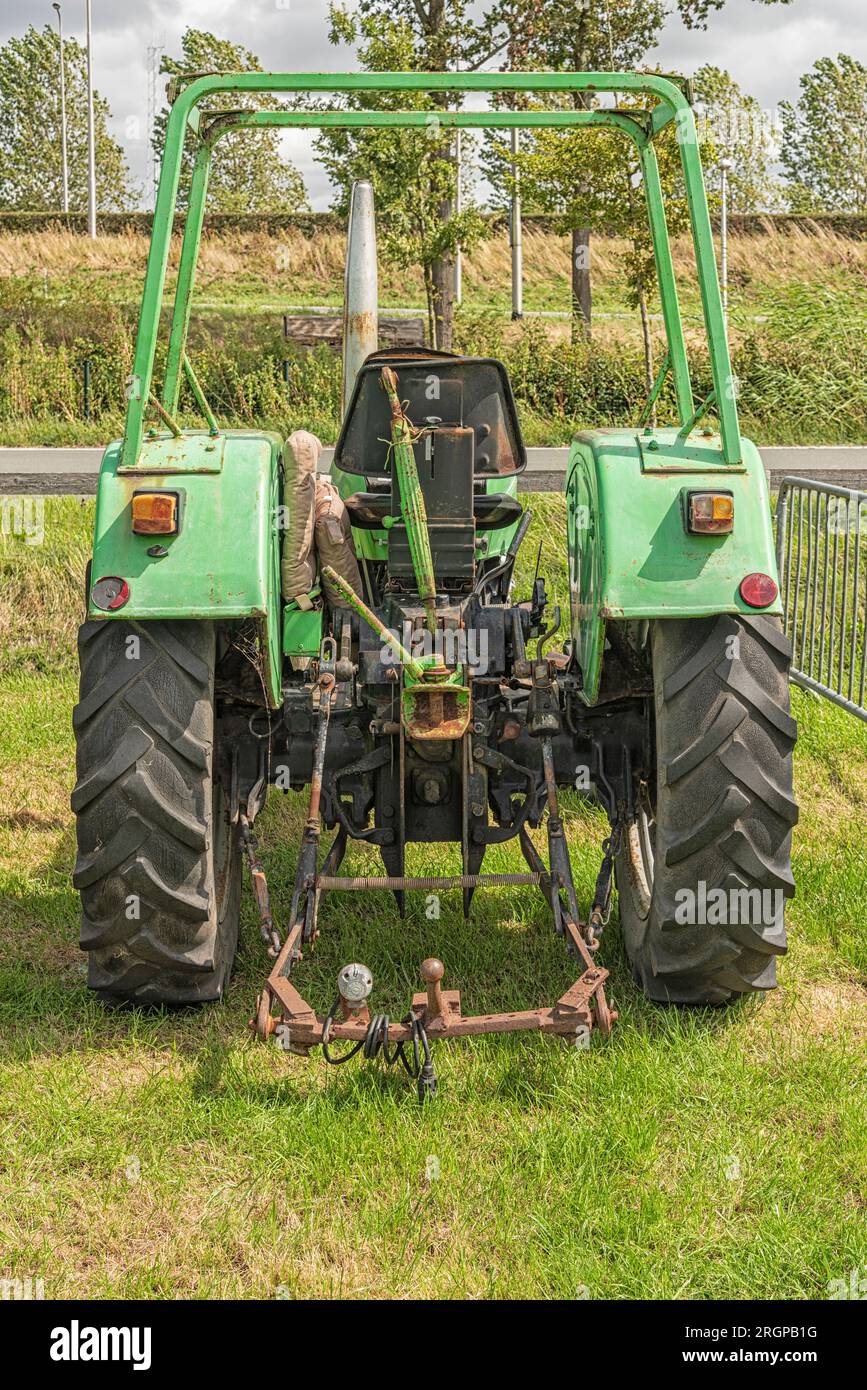 rear view of a Deutz farm tractor parked on a pasture Stock Photo