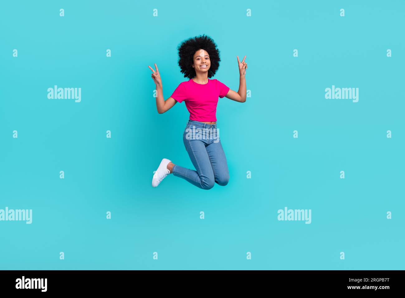 Full length portrait of excited little girl jumping hands fingers ...