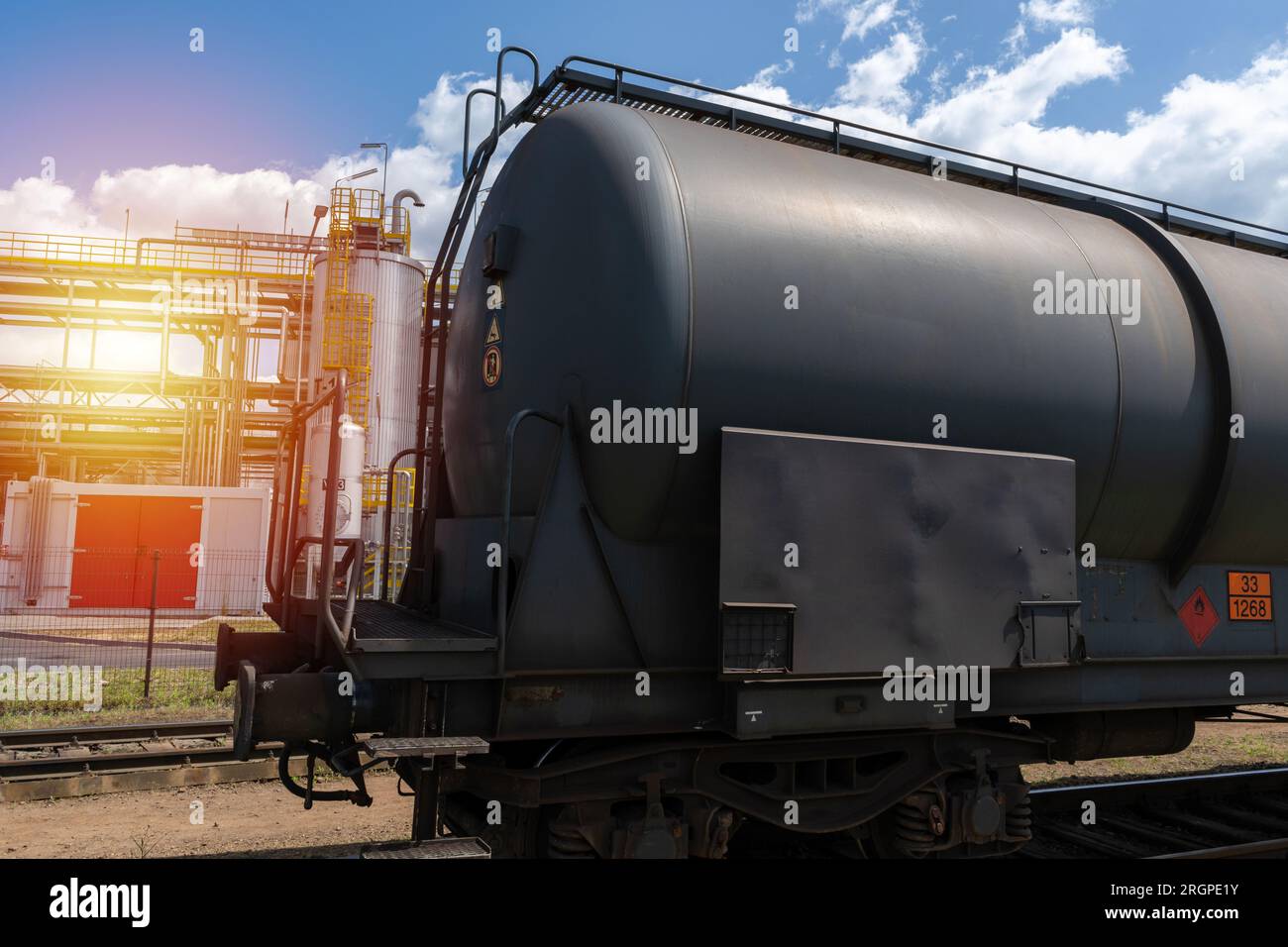 Railroad tank car near oil refinery. Railway train wagon to transport