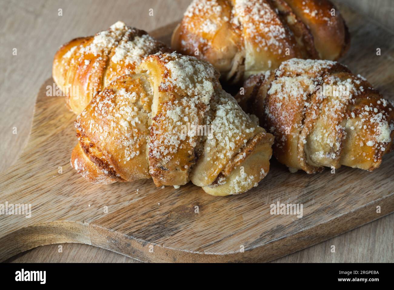 Fresh traditional polish pastry with poppy-seed filling and nuts. St. Martin's croissant, Rogal marciński, świętomarciński. Popular food from Poland. Stock Photo