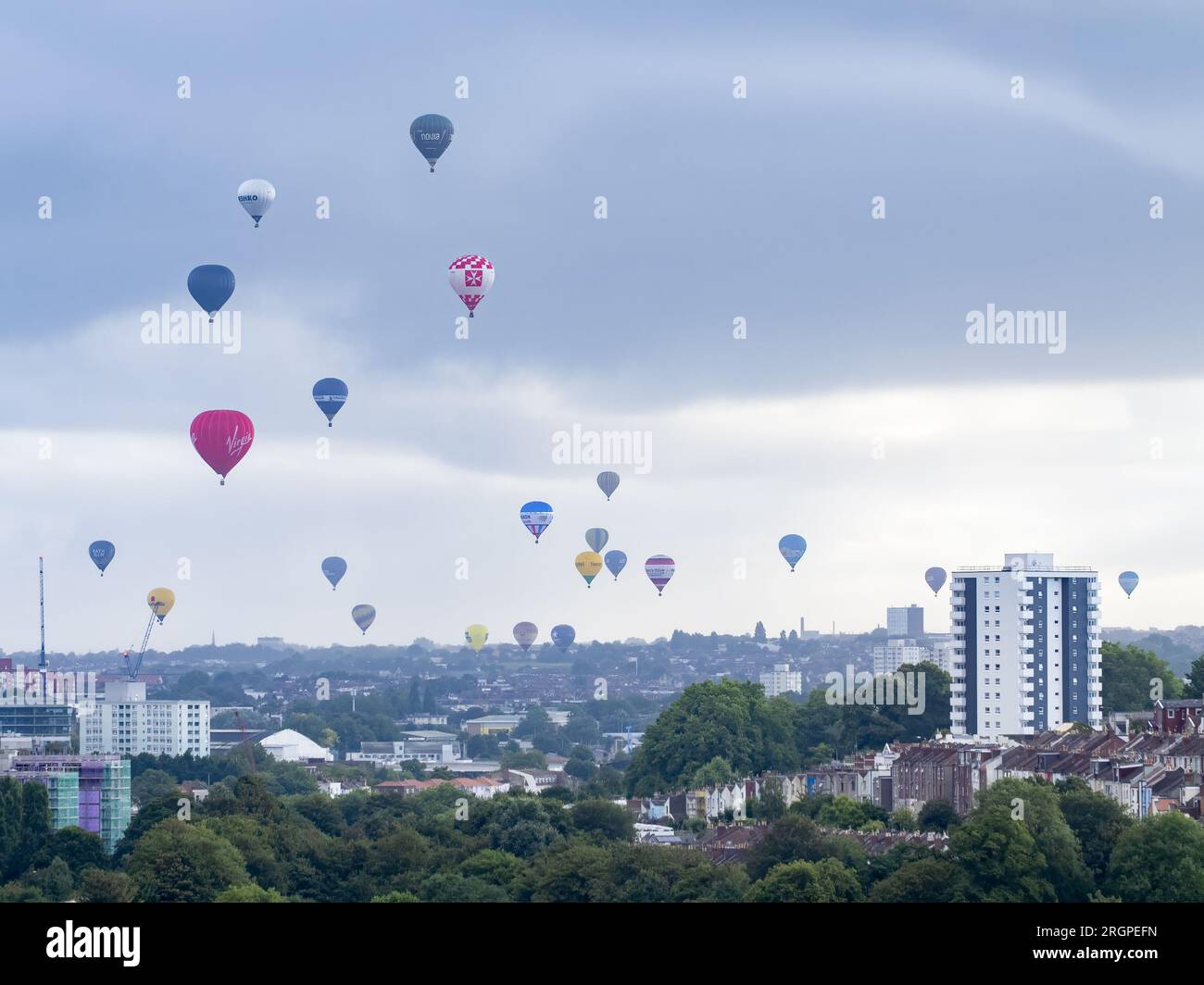 Hot air balloons flying over Bristol city Stock Photo