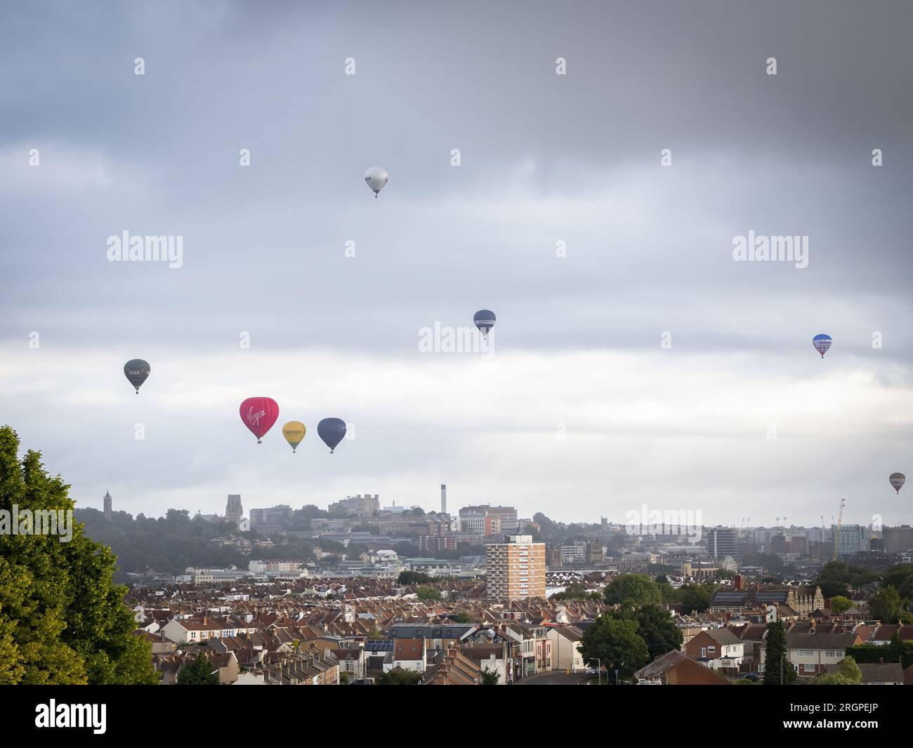 Hot air balloons flying over Bristol city Stock Photo