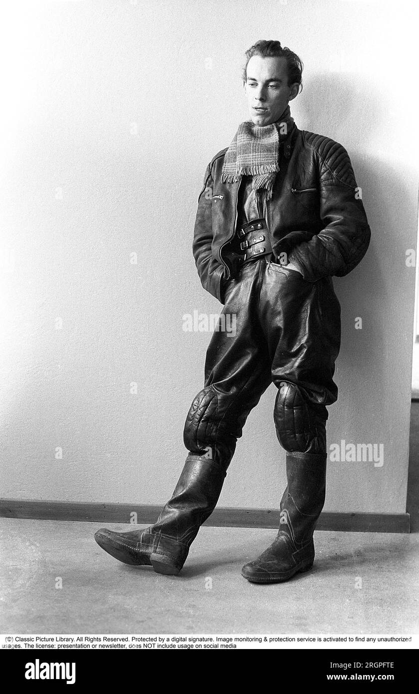 Motorcyclist in the 1950s. A young man dressed in the typical way the motorcyclists did in the 1950s. All leather. Leather boots, trousers and jacket. A kidney belt inside the jacket. Sweden 1955. He is actor Sven-Eric Gamble, 1924-1976. Kristoffersson ref 2B Stock Photo