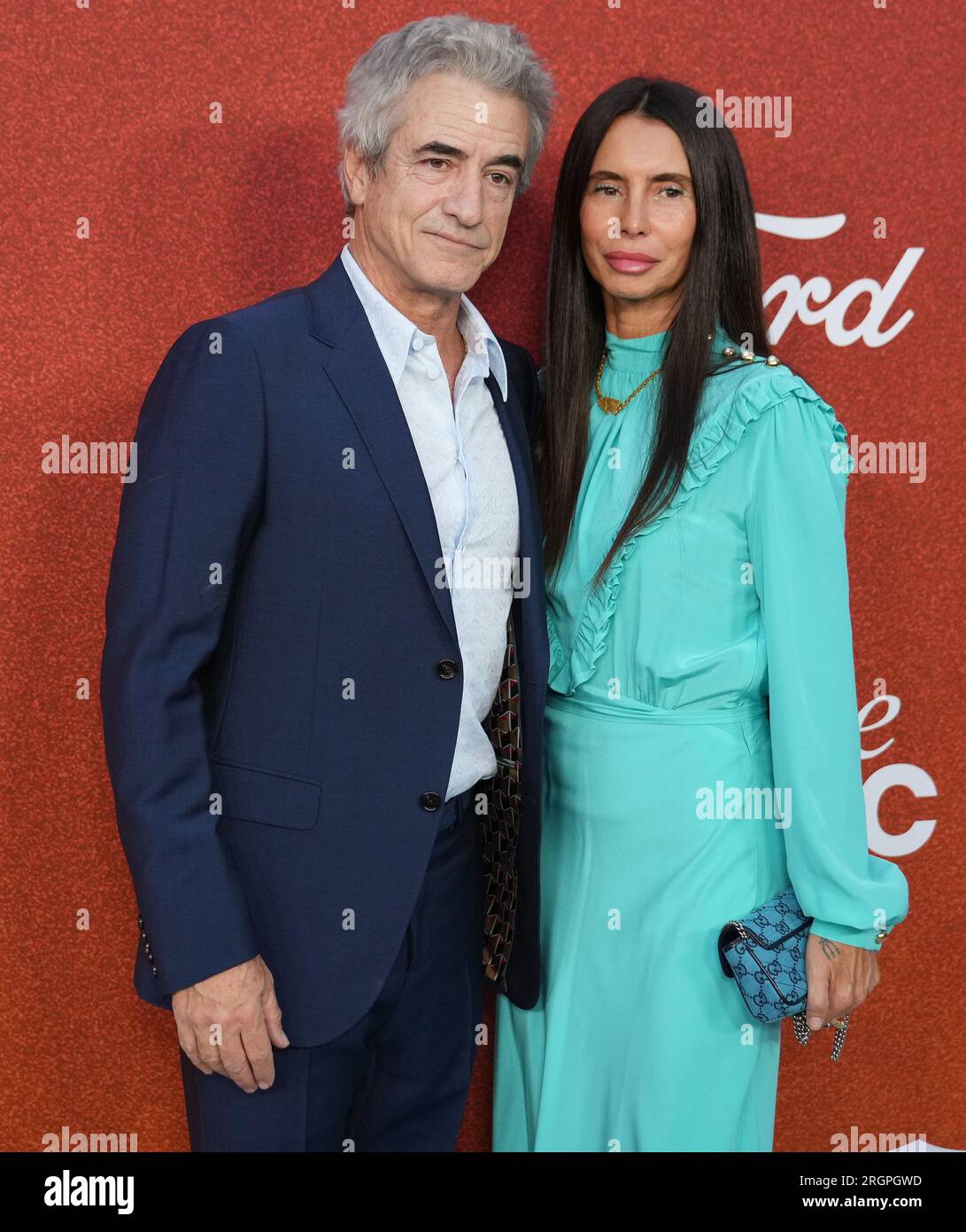 (L-R) Dermot Mulroney and Tharita Cesaroni arrives at the Variety Power