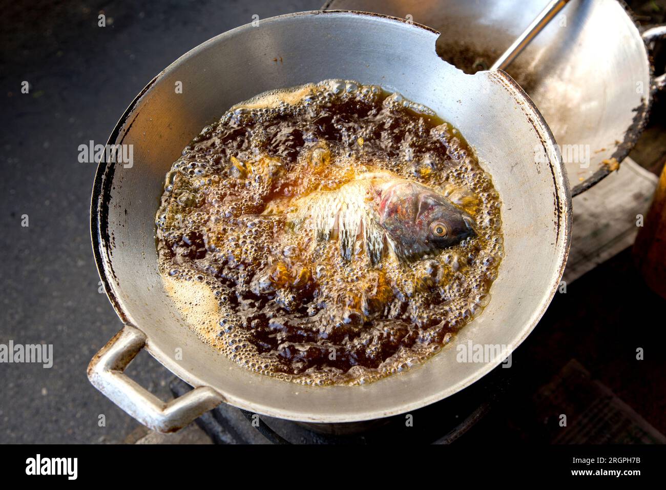 Oil fried fish hi-res stock photography and images - Alamy