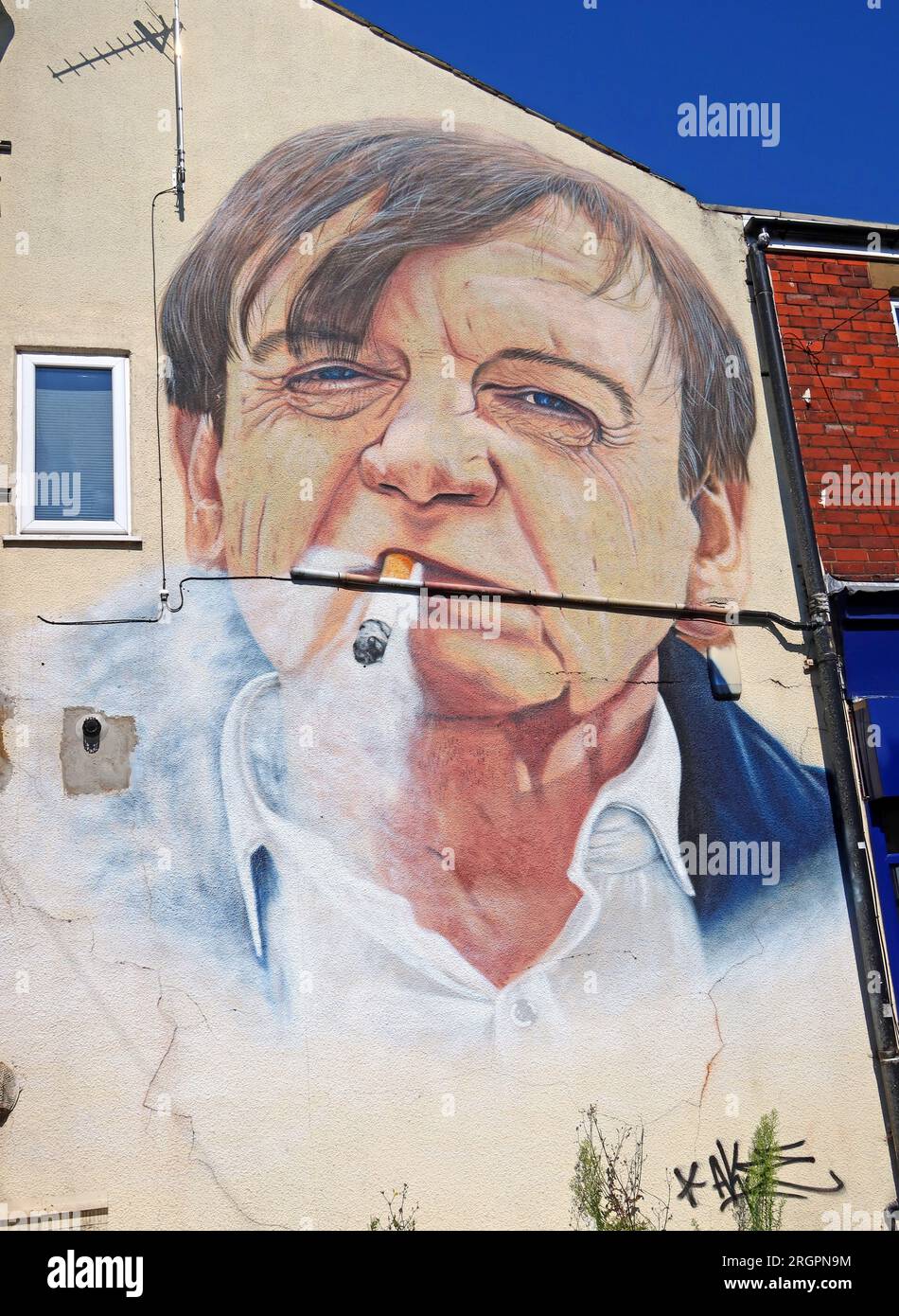 Mark E Smith, The Fall mural, on gable end of Chips at No8, 8 Clifton Rd, Prestwich, Bury, Manchester, England, UK,  M25 3HQ Stock Photo