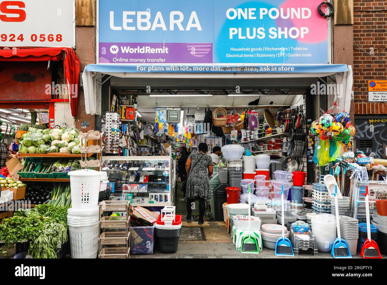 Electric Avenue, Brixton Market with shops, market stalls, people