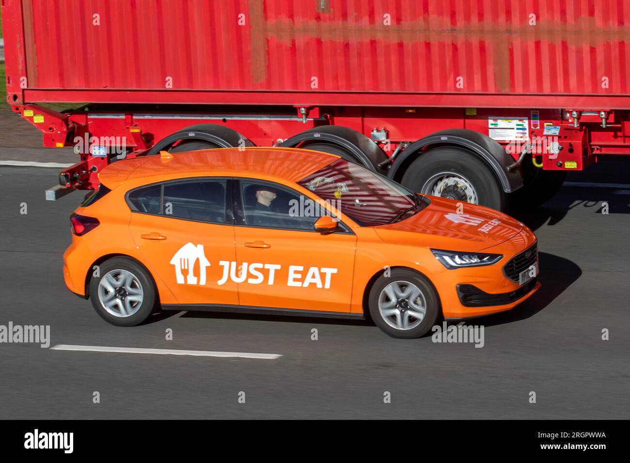 Just Eat 2022 Orange Ford Focus Trend Ecoblue Auto Stock Photo