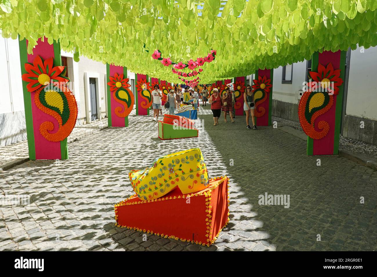 Ruas Floridas Flowered Streets festival with colourful paper flowers in Redondo, Alentejo, Portugal, Europe Stock Photo