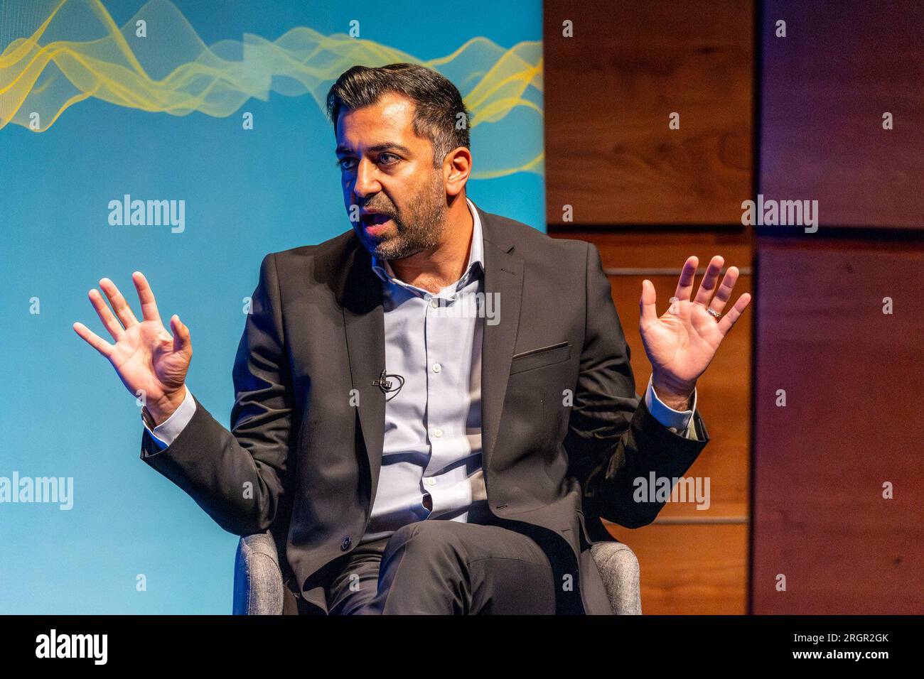 Edinburgh, United Kingdom. 11 August, 2023 Pictured: First Minister of Scotland and SNP leader Humza Yousaf MSP is interviewed by LBC presenter Iain Dale at the Edinburgh Fringe. When asked about Angus Brendan McNeill leaving the SNP, Yousaf said, 'We can’t pick and choose when to be a member of the SNP. It’s for the electorate to decide'. Credit: Rich Dyson/Alamy Live News Stock Photo