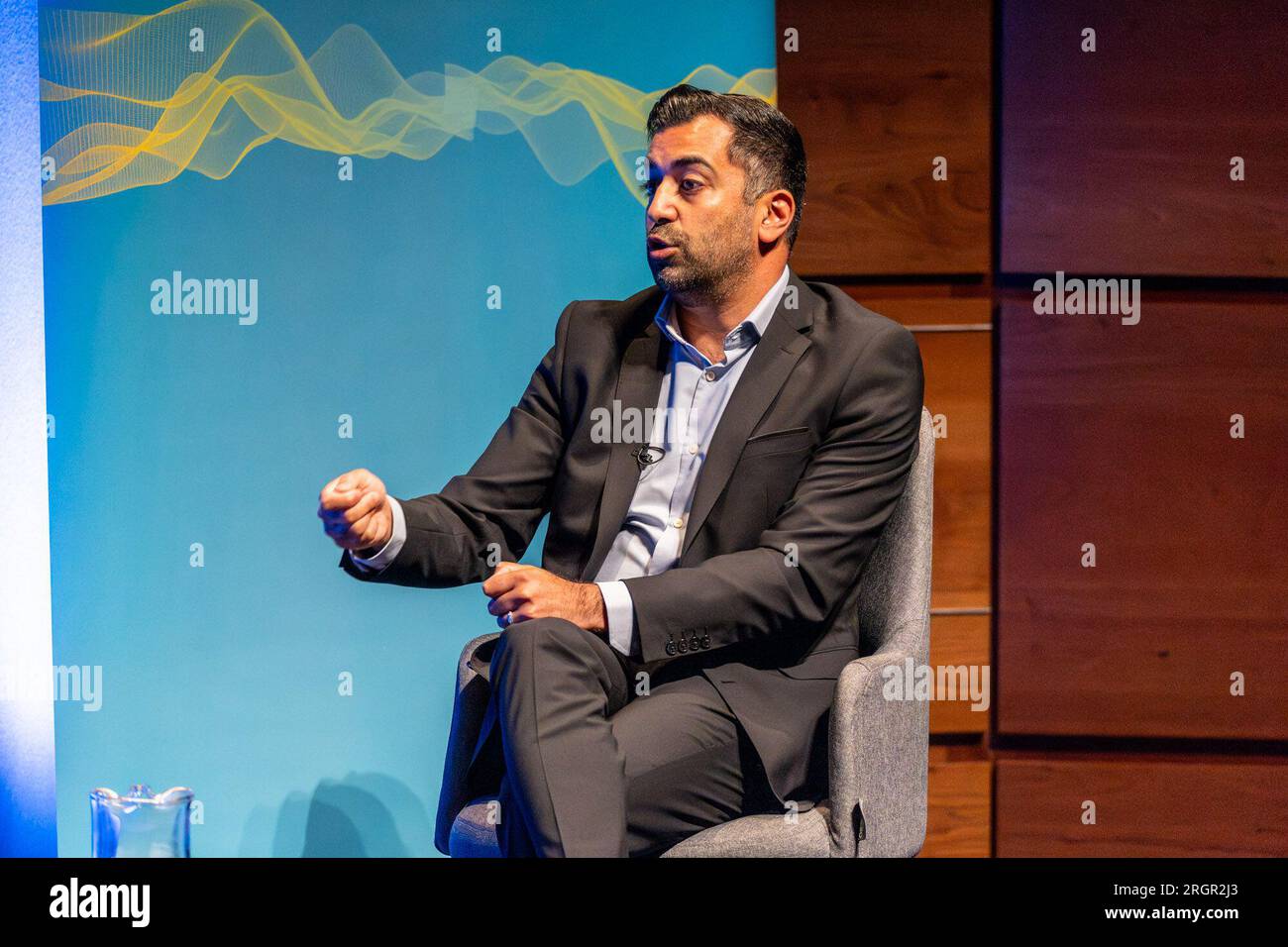 Edinburgh, United Kingdom. 11 August, 2023 Pictured: First Minister of Scotland and SNP leader Humza Yousaf MSP is interviewed by LBC presenter Iain Dale at the Edinburgh Fringe. When asked about Angus Brendan McNeill leaving the SNP, Yousaf said, 'We can’t pick and choose when to be a member of the SNP. It’s for the electorate to decide'. Credit: Rich Dyson/Alamy Live News Stock Photo