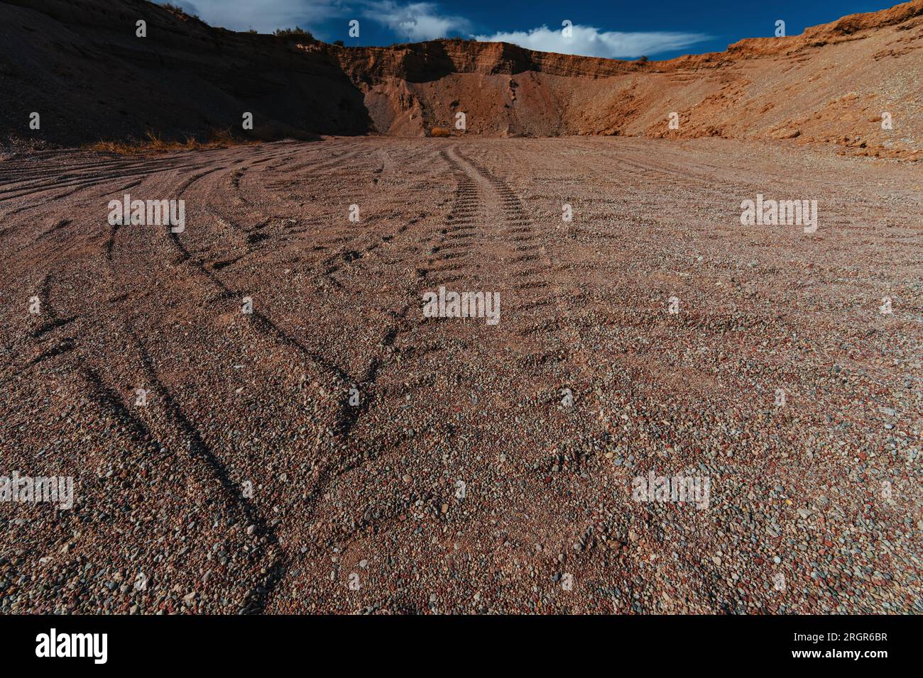Tractor tire tracks in sand quarry Stock Photo