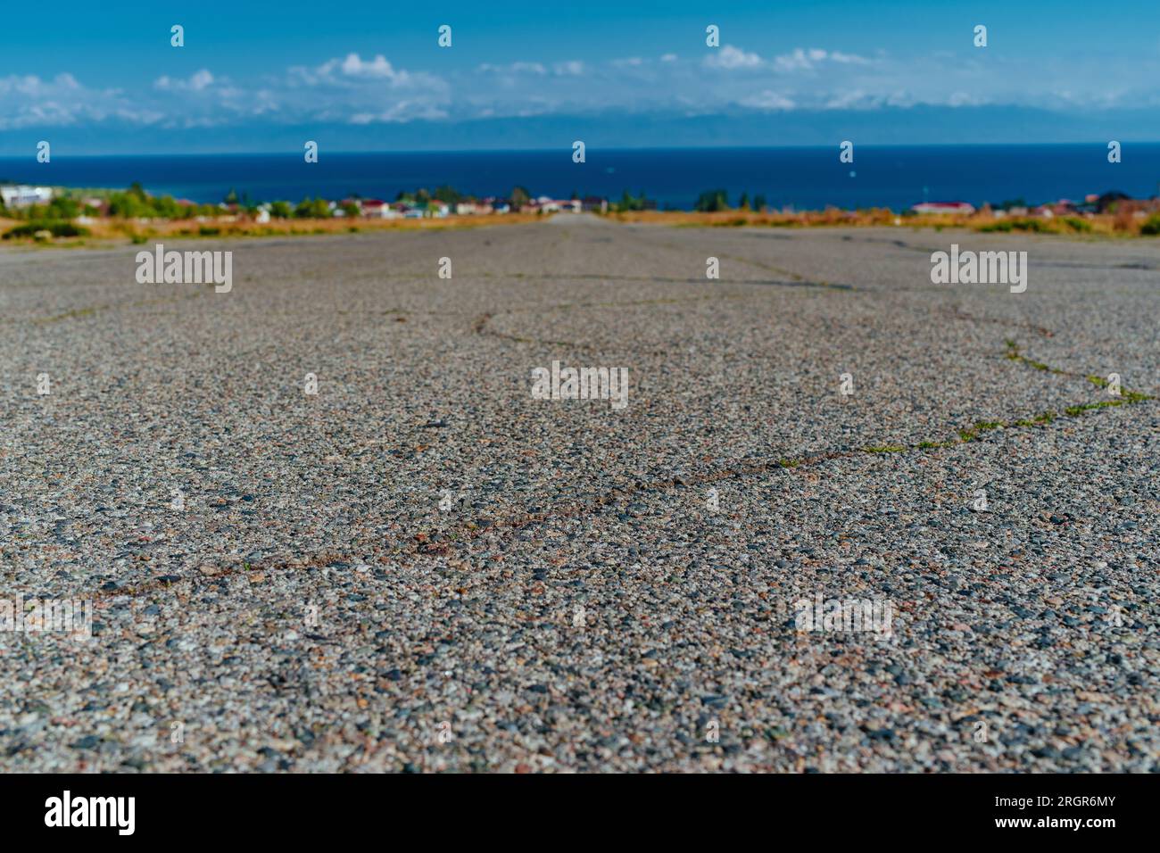Empty wide paved road on sea background Stock Photo