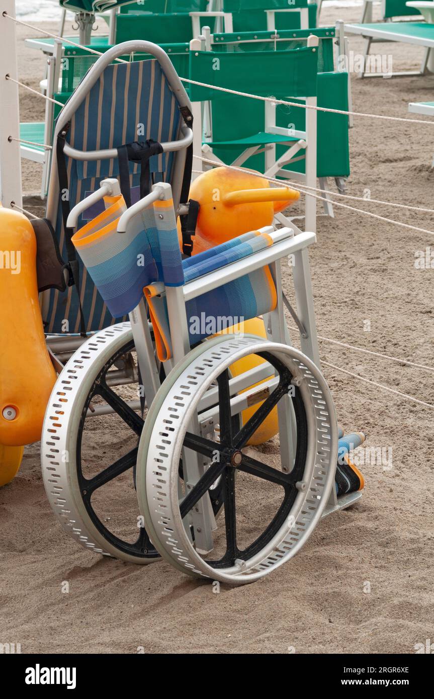 Wheelchair Used to Allow Disabled People on Beach Stock Photo