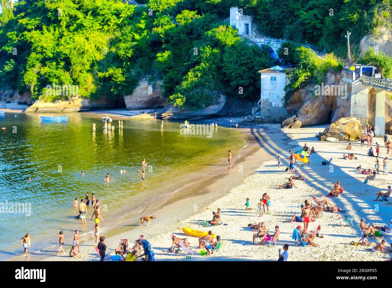 Niteroi, Brazil, Group of people enjoying the Bom Viagem or Bon Voyage beach in the coastline of the city. Stock Photo