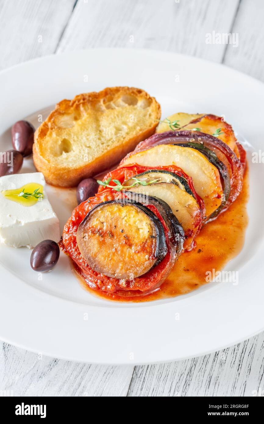 Portion of Briam Greek Vegetable Bake with feta Stock Photo Alamy