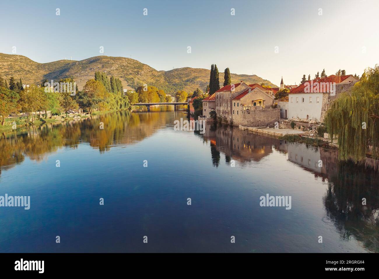 Trebinje, View of Old Town with Reflections in Trebišnjica River, Bosnia and Herzegovina Stock Photo