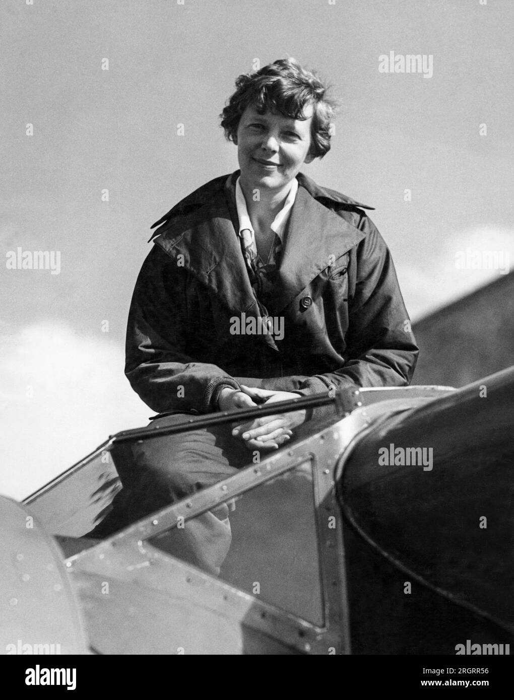 United States:  c. 1936. Amelia Earhart in the cockpit of her Lockheed Electra airplane. Stock Photo
