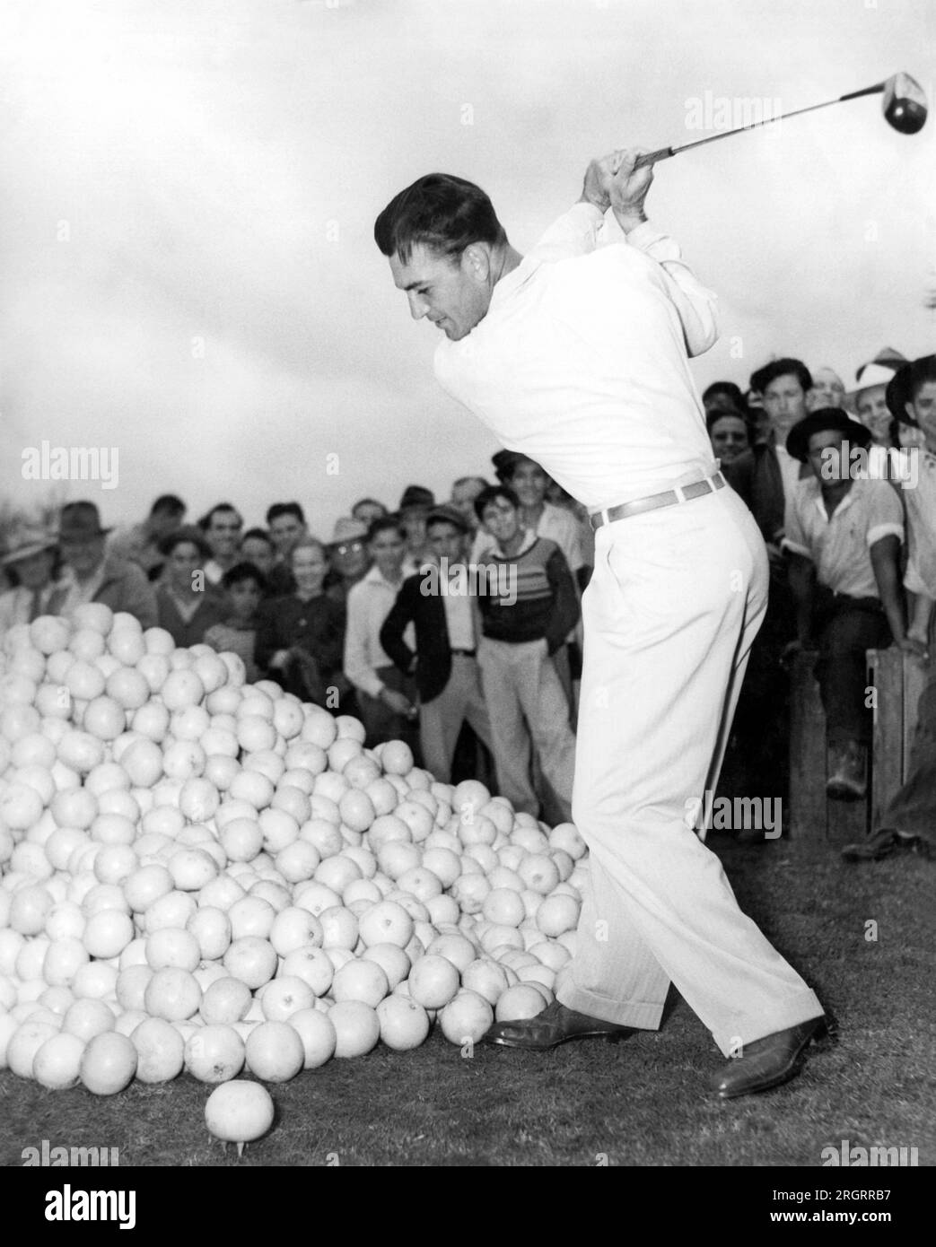 Florida: c. 1939 A young Ben Hogan puts on an exhibition by teeing off ...