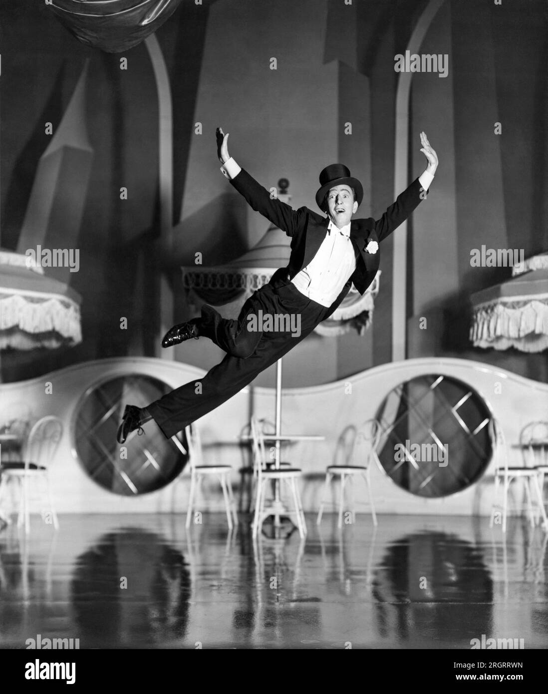 Hollywod, California:  June, 1941 Actor and dancer Ray Bolger seems to defie gravity in a film still from the movie musical 'Sunny'. Stock Photo