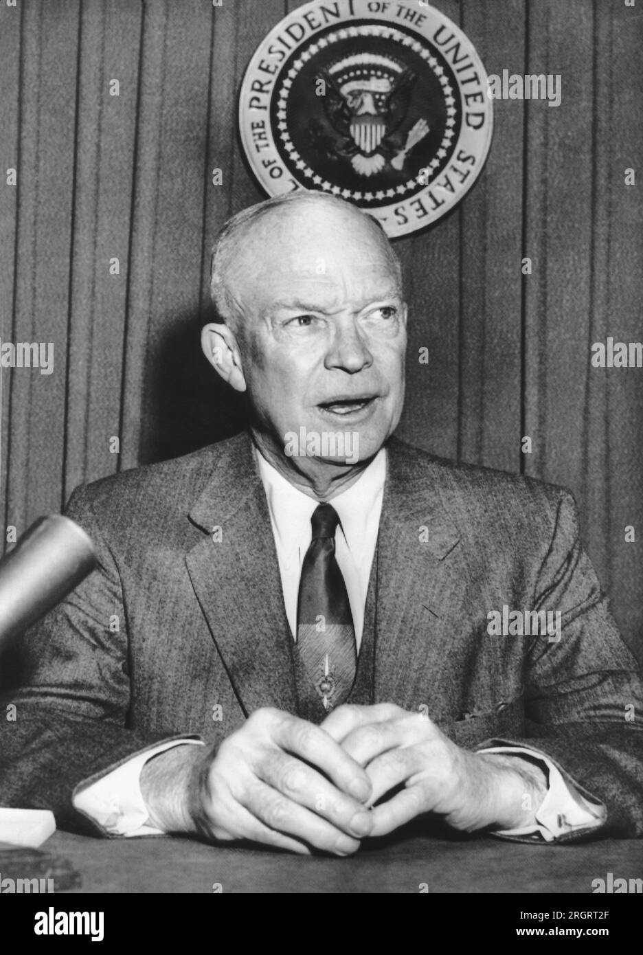 Washington, D.C.:   February 8, 1955 President Eisenhower speaking on a closed circuit television broadcast to 35 meetings throughout the country  in support of Radio Free Europe. Stock Photo