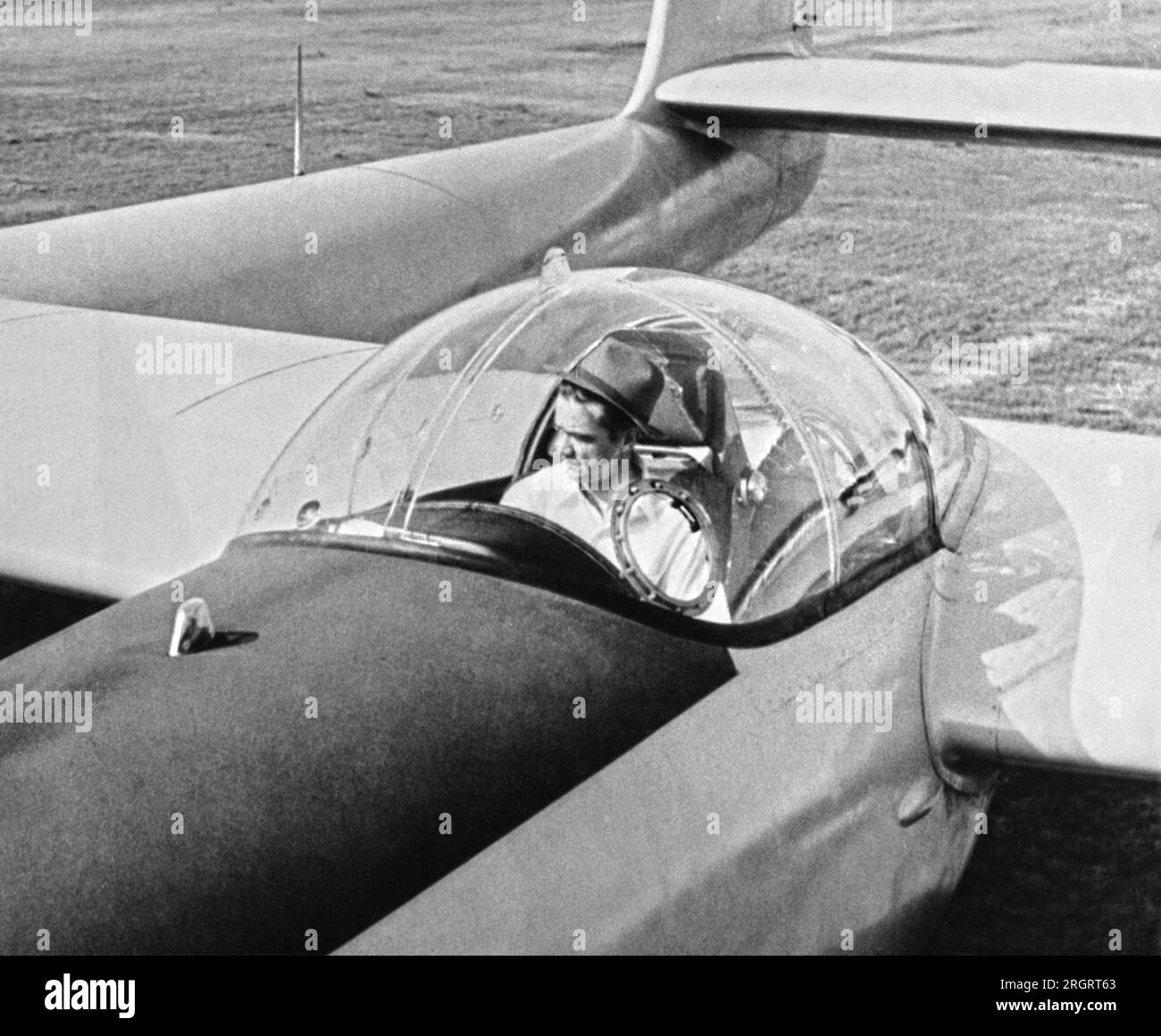 Culver City, California:   July 7, 1946 Howard Hughes sits in the cockpit of his new XF-11 plane, built in conjunction with the Army Air Material Command. It crashed on its flight, and Hughes was taken to a hospital with 3rd degree burns. It is reportedly one of the world's fastest planes and can attain speeds of over 400 mile per hour. Stock Photo