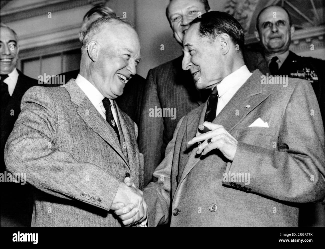 Washington, D.C.:  March 18, 1954 President Dwight D. Eisenhower and Gen. Douglas MacArthur shake hands after having had lunch together at the White House. Stock Photo