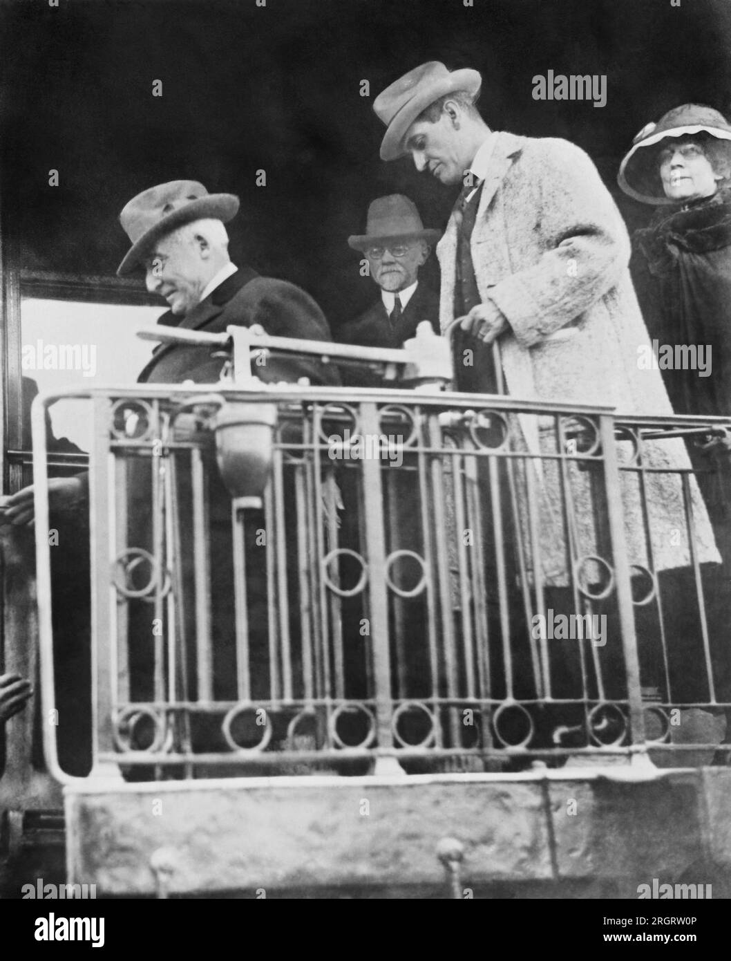San Francisco, California:  August 3, 1923 President Harding along with Mrs. Harding, Brig. General Sawyer and Secretary Christian leaving the train on their way to the Palace Hotel in San Francisco where the President died the next day. Stock Photo