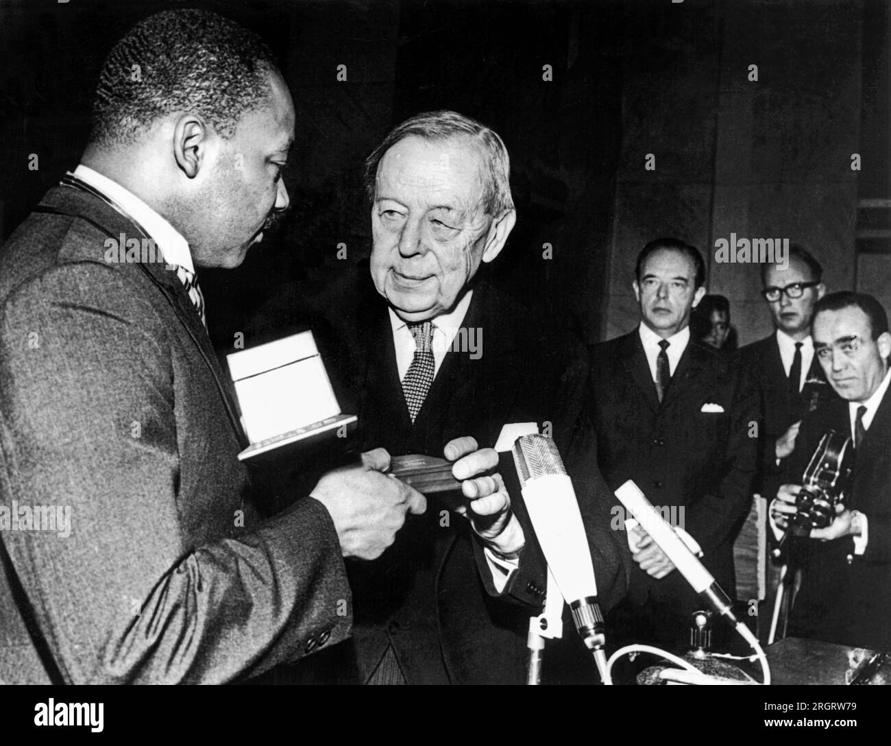 Oslo, Norway,  December 10, 1964 Rev. Martin Luther King, Jr., receives the Nobel Peace Price from Gunnar Jann, chairman of the Nobel Prize Committee, for his 'non-violent' leadership of the American civil rights movement. Stock Photo