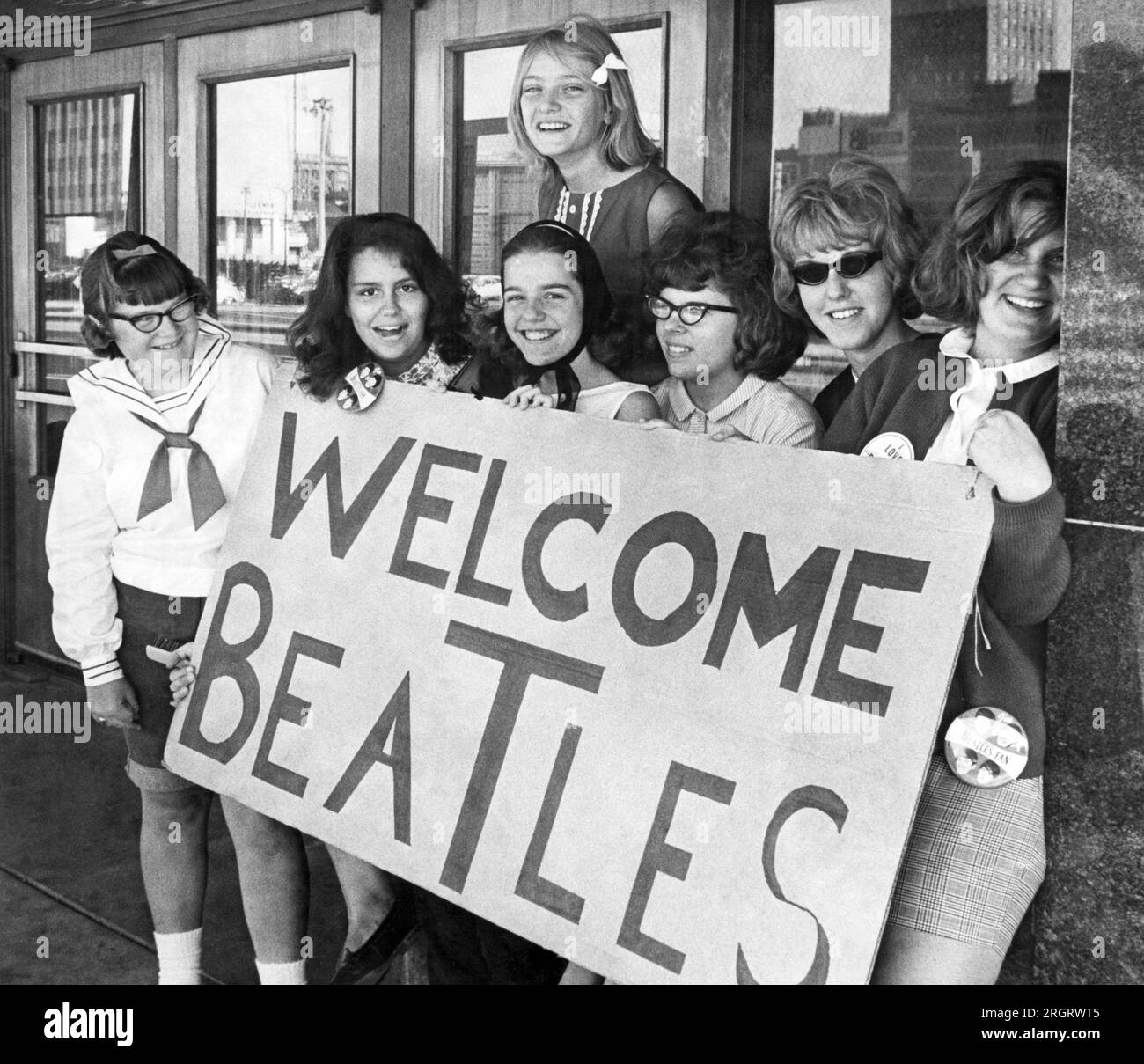 Milwaukee, Wisocnsin:  September 4, 1964 Beatles fans arrive early at the Arena to welcome their idols at their evening concert. Stock Photo