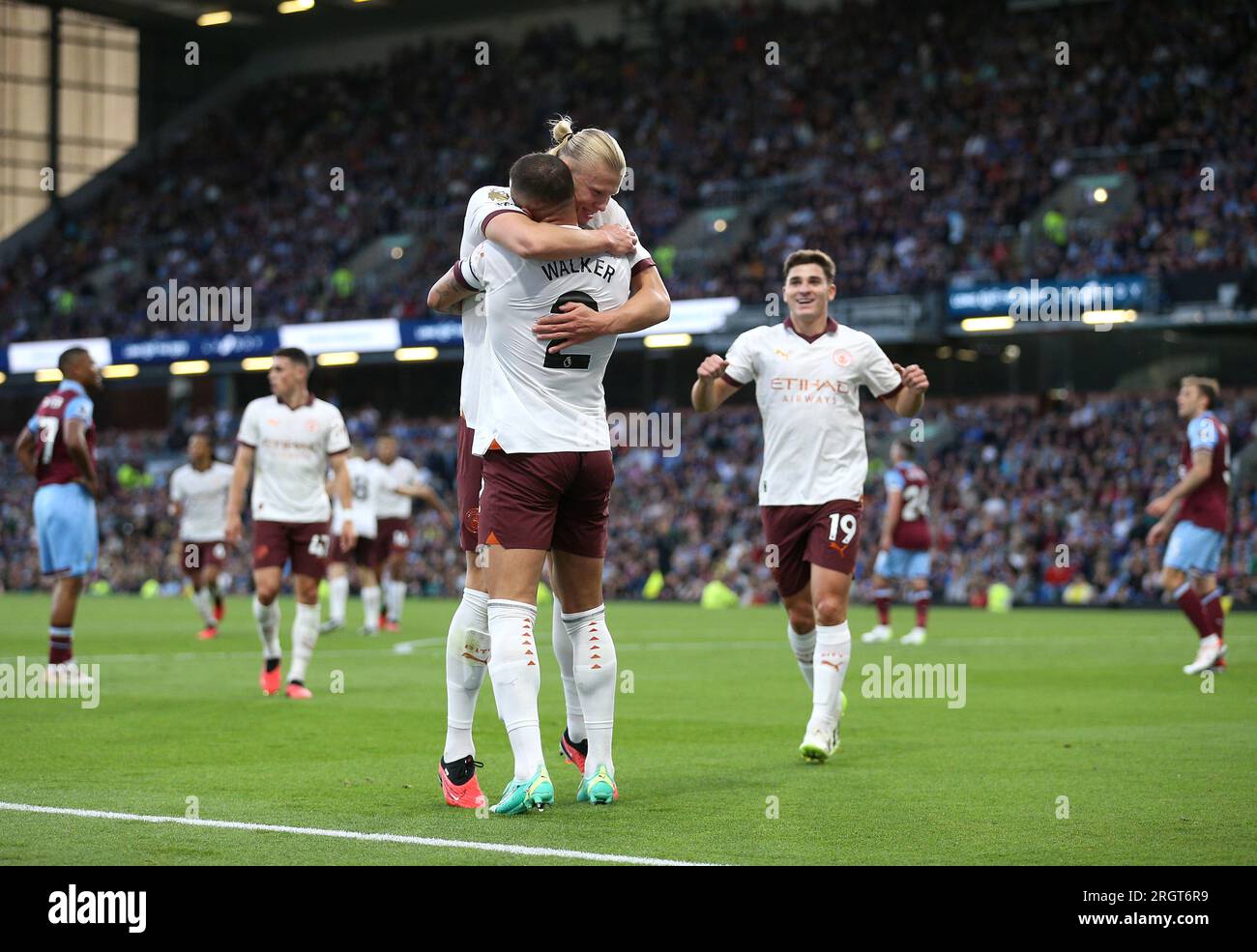 Manchester City's Erling Haaland celebrates scoring their side's second goal of the game with team-mate Kyle Walker during the Premier League match at Turf Moor, Burnley. Picture date: Friday August 11, 2023. Stock Photo