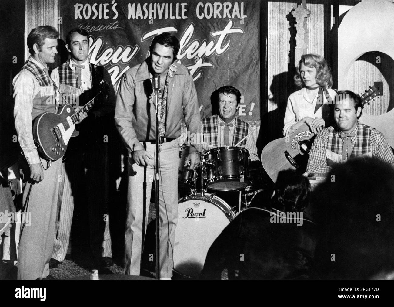 Jerry Reed, Don Williams, Burt Reynolds, James Hampton, Conny Van Dyke, Rick Hurst, on-set of the Film, 'W.W. and the Dixie Dancekings', 20th Century-Fox, 1975 Stock Photo