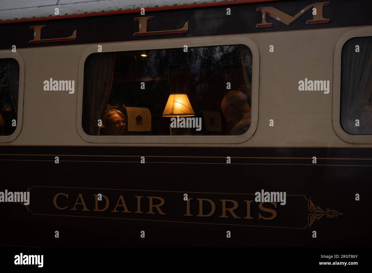 Statesman Rail pullman carriage window at night, UK Stock Photo