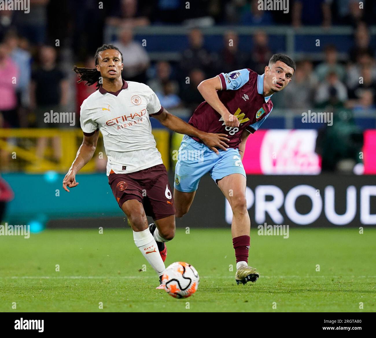 Burnley, UK. 11th Aug, 2023. Zeki Amdouni of Burnley with Nathan Ake of Manchester City during the Premier League match at Turf Moor, Burnley. Picture credit should read: Andrew Yates/Sportimage Credit: Sportimage Ltd/Alamy Live News Stock Photo