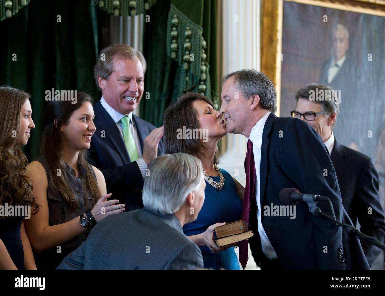 Elected Texas Attorney General KEN PAXTON kisses his wife ANGELA PAXTON as he is sworn into office by Governor GREG ABBOTT on January 5, 2015.  Paxton, now on leave from his post after 8 years in office, is facing impeachment charges in the Texas Senate in September for alleged abusing his office for personal gain. ©Bob Daemmrich Stock Photo