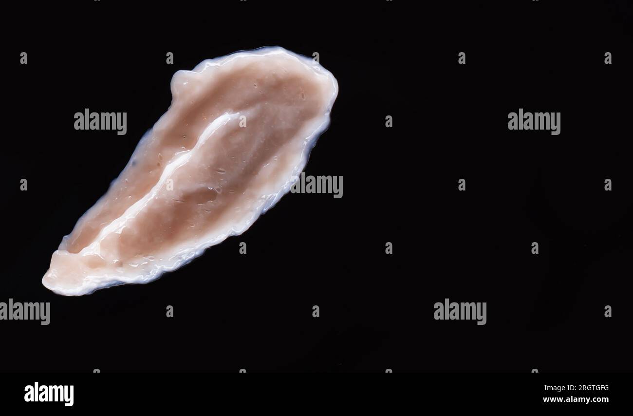 Drop of gel on black background Stock Photo