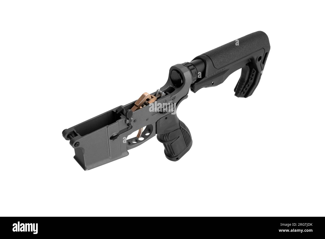 AR15 lower receiver iand buffer spring. Bottom half of a modern assault rifle. Isolate on white background. Stock Photo