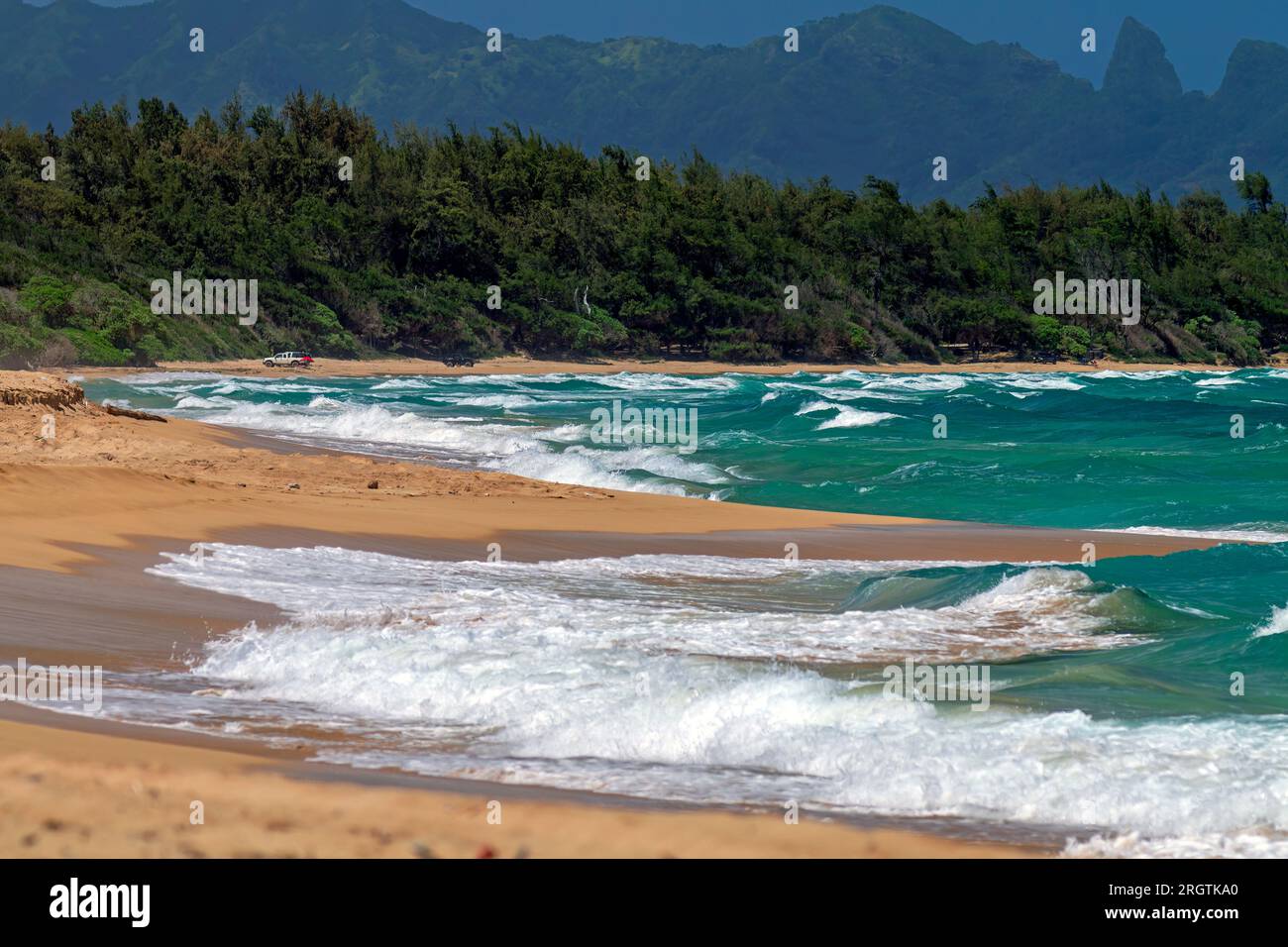 A beautiful beach landscape scene along the Pacific coastline on the island of Kauai, Hawaii. Stock Photo