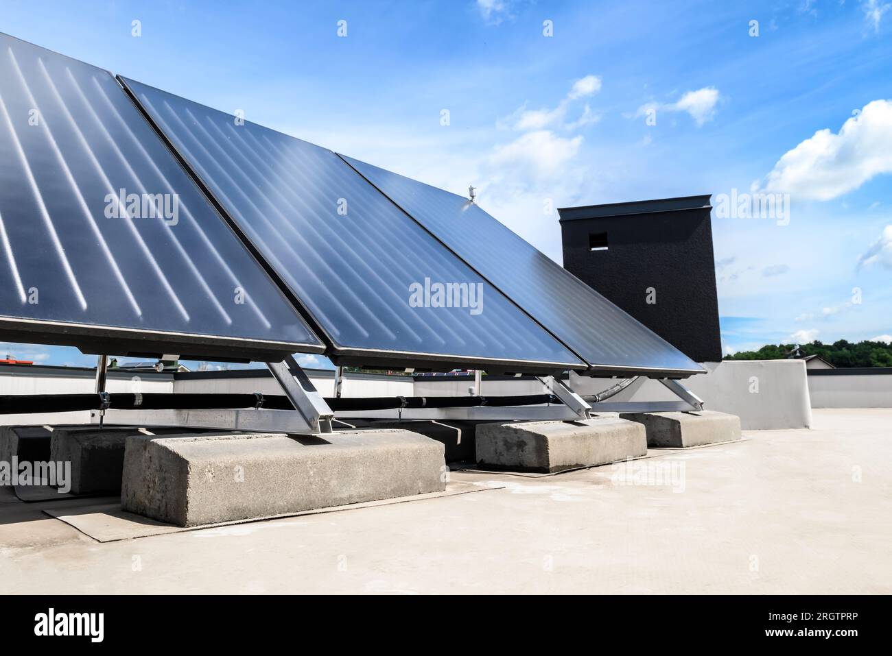 Heat pump and solar collector on the roof Stock Photo - Alamy