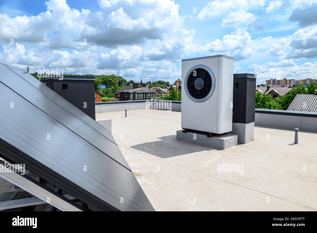 Heat pump and solar collector on the roof Stock Photo - Alamy