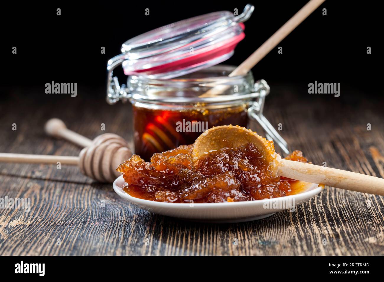 honey from long storage turned from liquid to solid, crystallized and