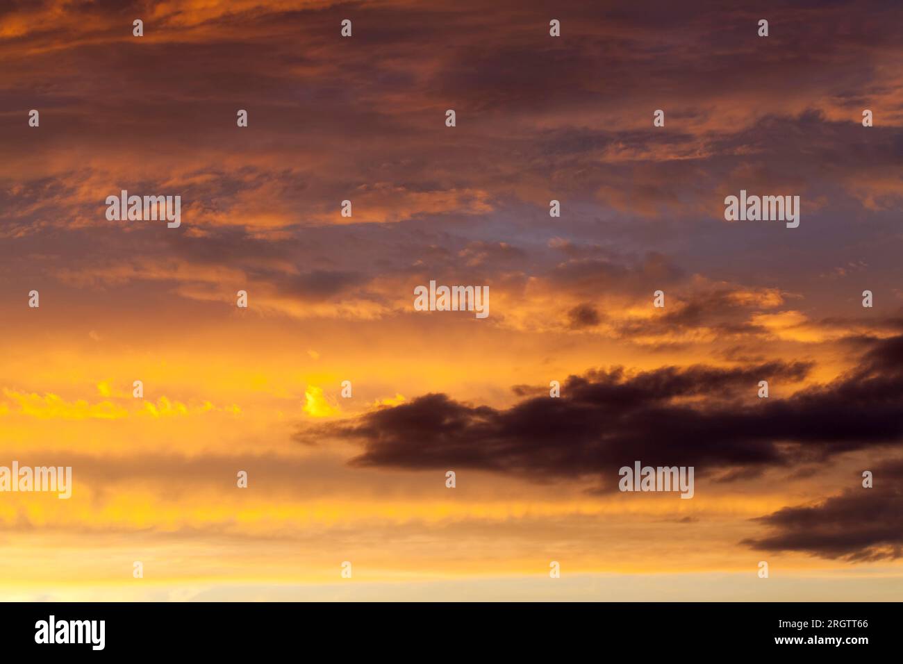 colorful yellow orange and other colors of the sky with clouds during ...