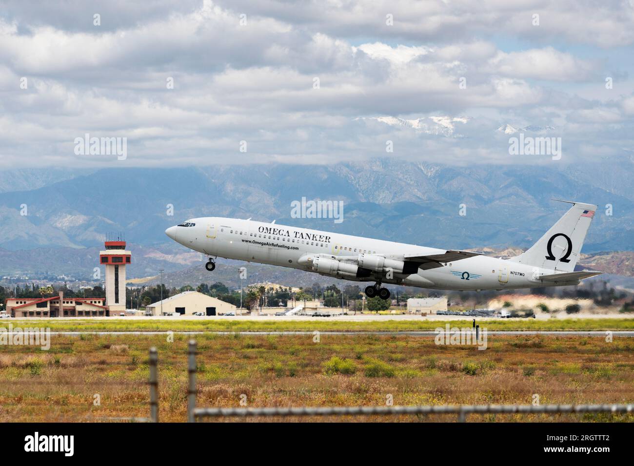 An Omega Air DC-10 refueling tanker takes off from March ARB. Stock Photo