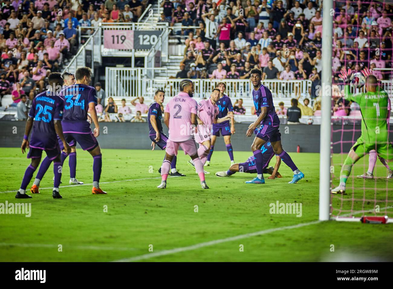 Fort Lauderdale, FL, USA. 11th August 2023. 10-Lionel Messi of Inter Miami, 2-DeAndre Yedlin of Inter Miami, 1-K. Kahlina of Charlotte during the match Charlotte FC vs. Inter Miami CF at DRV Pink Stadium in Florida, USA. Credit: Yaroslav Sabitov/YES Market Media/Alamy Live News Stock Photo