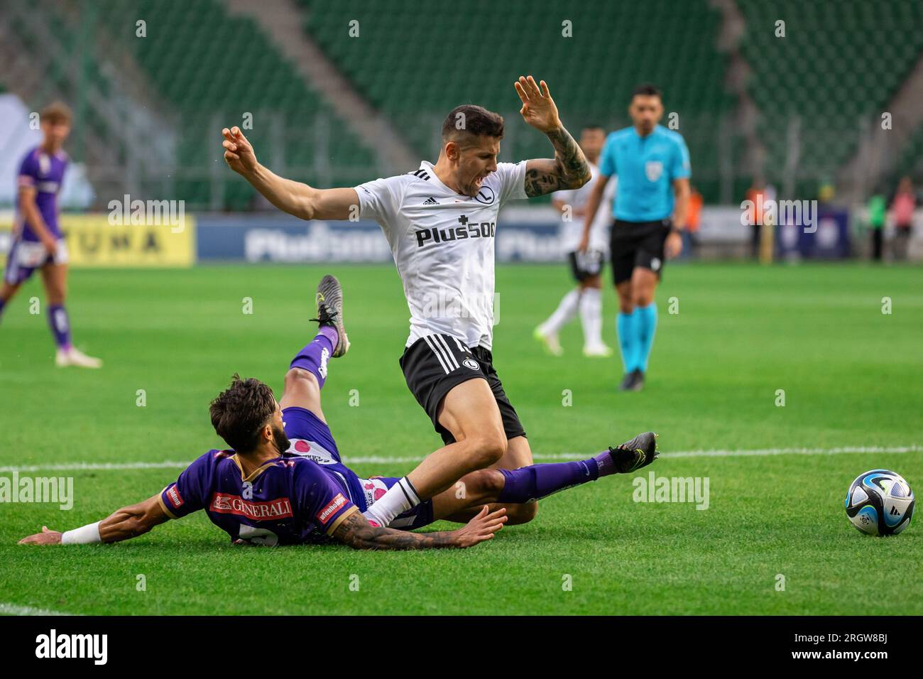 Warsaw, Poland. 10th Aug, 2023. Lucas Galvao da Costa Souza (L) of Austria and Pawel Wszolek (R) of Legia in action during the UEFA Europa Conference League third qualifying round match between Legia Warszawa and FK Austria Vienna at Marshal Jozef Pilsudski Legia Warsaw Municipal Stadium. Final score; Legia Warszawa 1:2 FK Austria Vienna. Credit: SOPA Images Limited/Alamy Live News Stock Photo